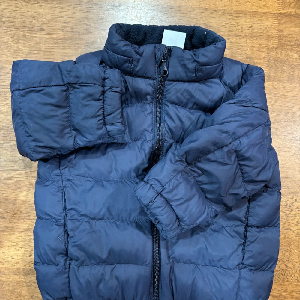 Navy front zip puffer jacket, 12-18 months, gentle used. From Uniqlo.